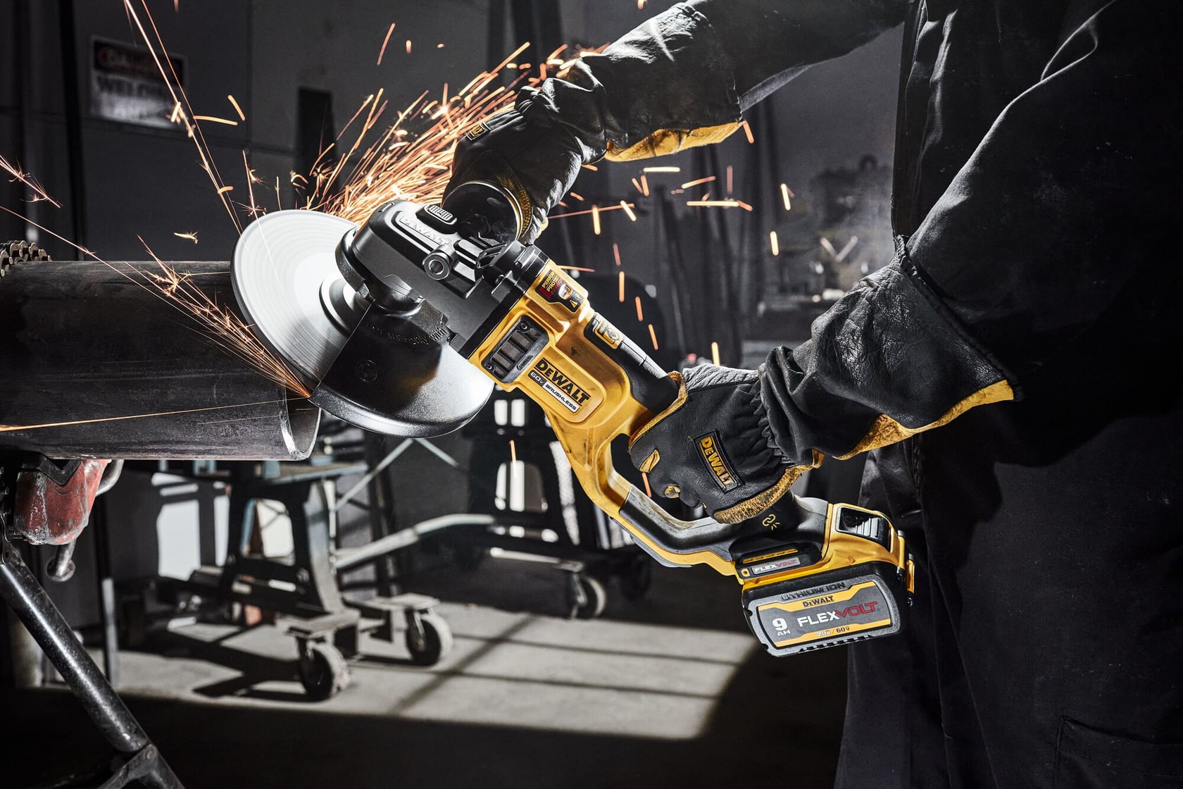 DEWALT worker using the 7 IN. - 9 IN. LARGE ANGLE GRINDER KIT