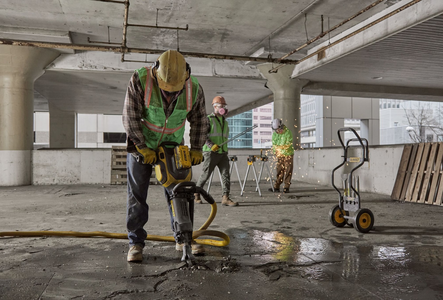 20V MAX* demo hammer chipping into concrete floor