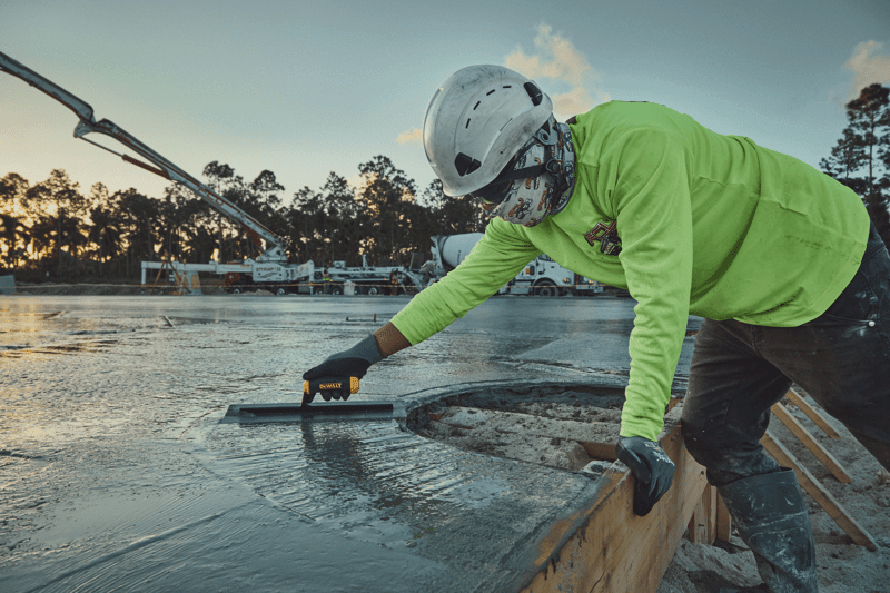 DEWALT hand trowel smoothing concrete wall