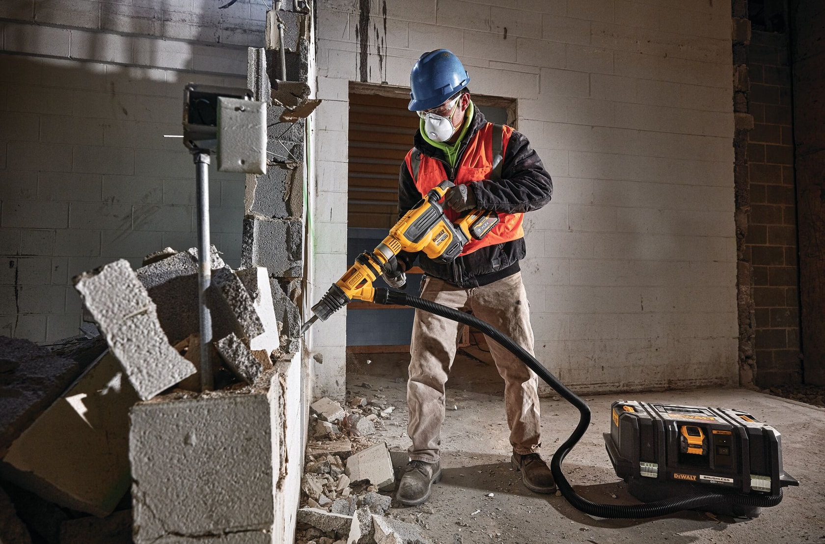SDS MAX Brushless combination rotary hammer being used by a person