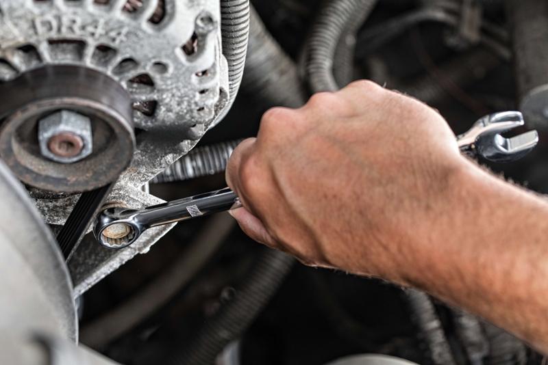 205 piece mechanics tool set being used on machinery.